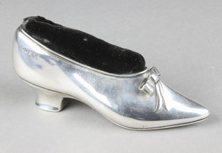 An Edwardian silver novelty pin cushion in the form of a lady's shoe, London 1902 5" 