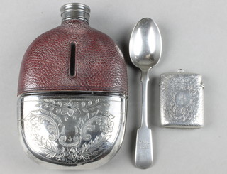 An Edwardian silver plated hip flask with cup base, a silver vesta and teaspoon