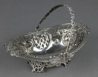 A Victorian repousse and pierced silver swing handled basket Birmingham 1896, 176 grams 7" 