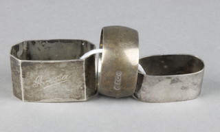 2 silver napkin rings and a plated ditto 