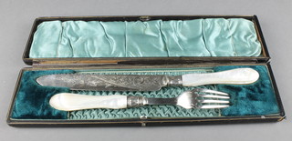 A cased pair of mother of pearl and silver plated servers 
