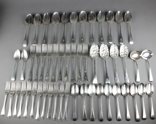 A matched Georgian canteen of Old English silver cutlery  with armorial 1803-1835, 2498 grams
