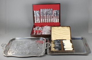 A cased canteen of silver plated Kings pattern cutlery, a cased set and 2 trays
