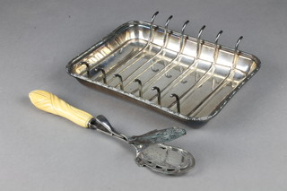 A pair of Edwardian silver plated asparagus servers with carved ivory handle and a ditto asparagus dish 