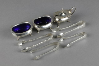 A silver mustard,  4 pairs of silver nips, 2 salts