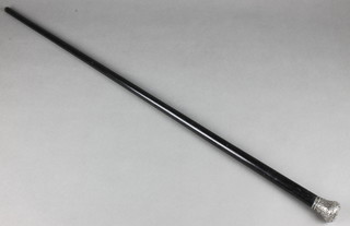 An ebony walking cane with silver knop