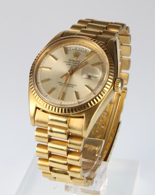 A gentleman's 18ct gold Rolex Oyster perpetual day date wristwatch on a ditto bracelet 