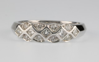 A 14ct white gold fancy diamond set ring, size M