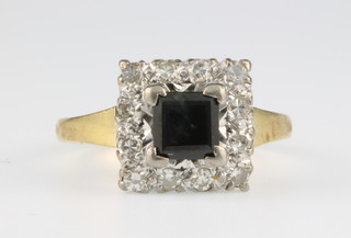 An 18ct yellow gold sapphire and diamond square cluster ring, size K