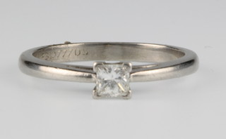 A platinum princess cut single stone diamond ring 0.25ct, size L