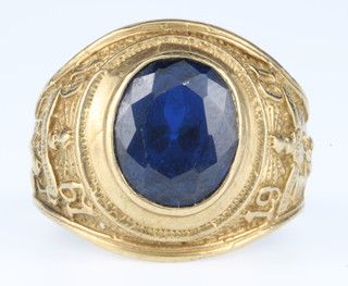 A gentleman's 9ct gold gem set fraternity ring, size V, 10 grams