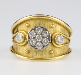 An 18ct diamond set etruscan style dress ring, size L 1/2