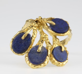 An 18ct gold freeform lapis lazuli dress ring, 8 grams, size L