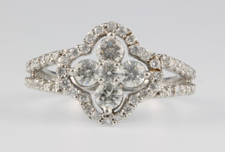 A 14ct open set diamond ring, size M 1/2
