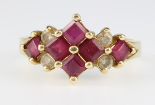 A 14ct gold ruby and diamond ring, 4 grams, size M