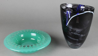 A Kosta Boda amethyst glass vase 8", a ditto green flash glass bowl 9"