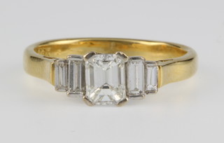 An 18ct yellow gold 5 stone baguette cut diamond ring, size I