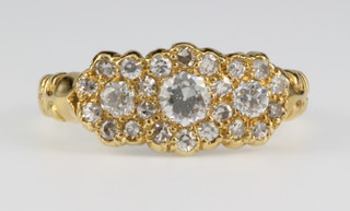 An 18ct yellow gold diamond triple cluster ring 0.75ct, size M 