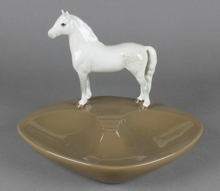 A Beswick ashtray surmounted by a standing horse 11 1/2" 