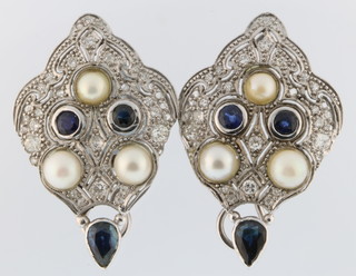 A pair of white gold sapphire, diamond and pearl, Art Deco style ear clips 