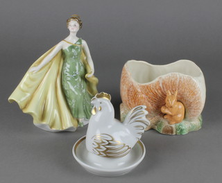 A Royal Doulton figure  - Alexandra HN2398 8", a Worcester egg cup and cover and a Sylvac rustic bowl 