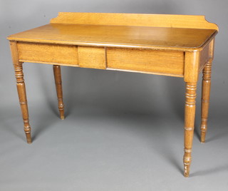 A Victorian oak serving table with raised back, fitted 1 long drawer, raised on turned supports 39"h x 57"w x 23"d 