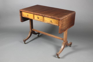 A 19th Century rectangular rosewood and crossbanded sofa table fitted 3 short drawers, raised on standard end supports with H framed stretcher 29"h x 20"w x 36" when closed x 55" when fully extended 