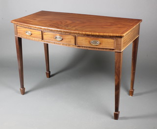 A 19th Century mahogany bow front side table with crossbanded top, fitted 3 short drawers, raised on square tapering supports, spade feet, 31"h x 44"w x 22"d 