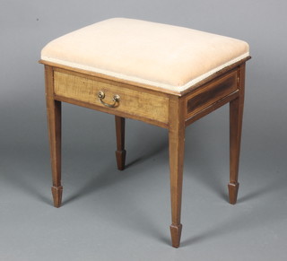 An Edwardian rectangular inlaid mahogany piano stool, fitted a drawer, with upholstered seat, on square tapering supports 21"h x 19 1/2"w x 15"d 