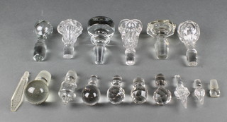 A collection of clear glass decanter stoppers