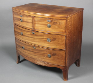 A 19th Century mahogany bow front chest of 2 short and 3 long drawer, raised on splayed bracket feet 34"h x 34 1/2"w x 20"d 