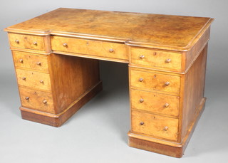 A Victorian figured walnut inverted breakfront kneehole pedestal partners desk, fitted 1 long and 2 short drawers, the pedestals fitted 6 short drawers with cupboard 29 1/2"h x 54"w x 29"d 