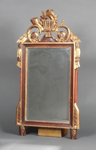 A rectangular bevelled plate wall mirror contained in a decorative gilt frame with carved pierced decoration 34"h x 18"w 