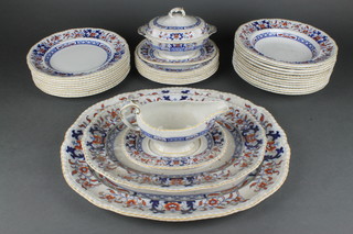 An Edwardian Mintons floral dinner service comprising 6 side plates, 12 soup bowls, 9 dinner plates, 2 meat plates, a tureen, lid and stand, a sauce boat and stand 