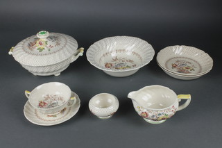 A Royal Doulton Grantham dinner service comprising 4 two handled bowls, a small bowl, oval dish, 2 sauce boats, 1 breakfast bowl, 11 sandwich plates, 2 small plates, 12 side plates, 10 small dinner plates, 9 large dinner plates, 1 soup bowl, 1 tureen and cover, 4 oval plates, 1 salad bowl, 2 shallow dishes, 1 square plate and a tureen lid 