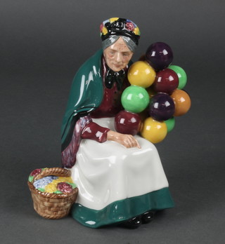 A Royal Doulton figure - The Old Balloon Seller HN1315 8" 