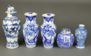 A pair of Japanese blue and white oviform vases decorated with flowers 8" and 3 other vases 