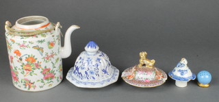 An early 20th Century Cantonese teapot decorated with birds amidst flowers and 3 lids