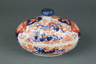 An Imari egg shaped box and cover decorated with stylised birds amongst flowers 7" 