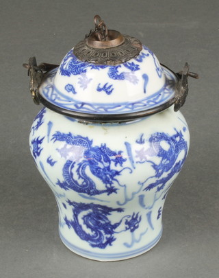 A Chinese blue and white baluster vase and cover with metal mounts and 6 character mark to base 6" 