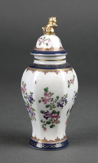 A 19th Century Samson hexagonal baluster vase and cover decorated with peony, having a shi shi finial 6 1/2" 