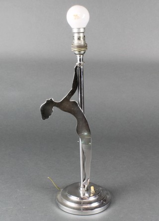 An Art Deco chromium plated silhouette style lamp of a standing lady 15 1/2" 