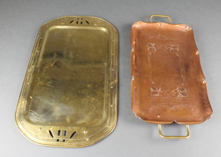 An Art Nouveau rectangular embossed twin handled tray, raised on bun feet, the base with running ostrich marks 14" x 8"n together with an Art Nouveau oval brass tea tray 18" x 10 1/2" 