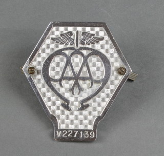 An AA commercial vehicle badge marked V227139 