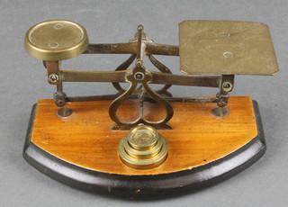 A pair of 19th Century brass and mahogany letter scales complete with weights 