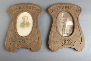 A pair of WWI oak Trench Art photograph frames marked France 1918 8" x 6" 