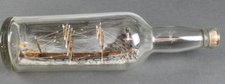 A 3 masted ship in a bottle  11 1/2" 