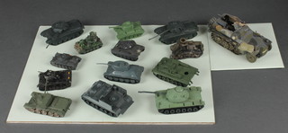 An Airfix model of a WWII German Hanomag Halftrack together with a collection of 13 model tanks 
