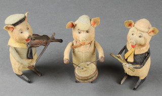 A Schuco 3 piece automaton band comprising fiddler, drummer and flautist 