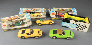 A Scalextric Triang model of a Lister Jaguar MM/E1 - boxed, ditto C83 Sunbeam Tiger - boxed (slightly damaged), ditto C20 Dart Special GP - boxed (slightly damaged) and 3 slot cars 